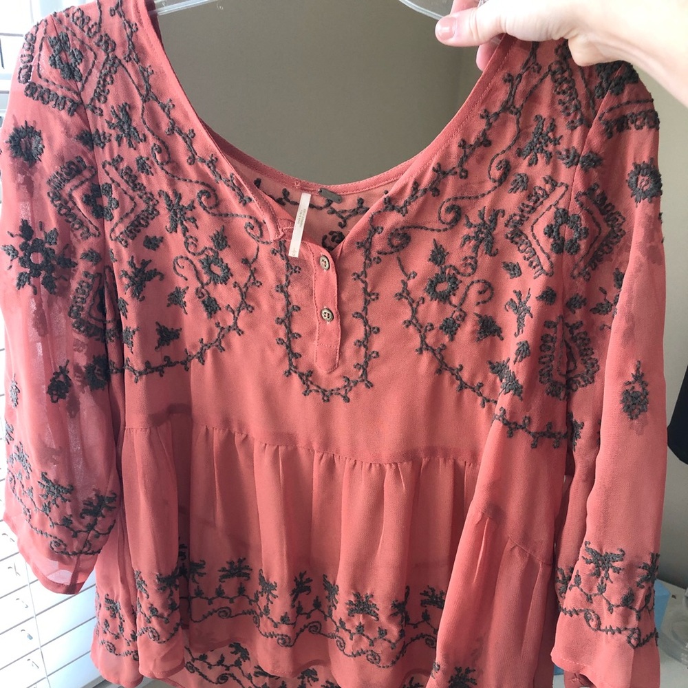 Free People Rust colored blouse with embroidery
